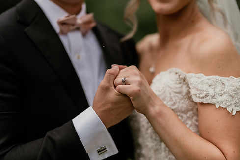 Close-Up of Wedding Ring and Couple Holding Hands at Bedford Event Center