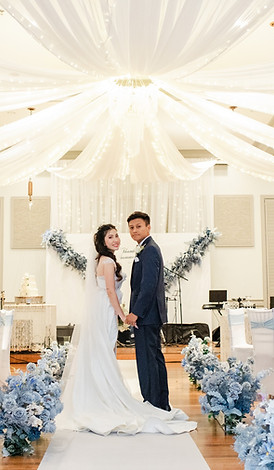 Bride and Groom Wedding Ceremony Under Draped Ceiling at Bedford Event Center