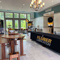 Corporate Event Welcome Table with Branding and Snacks